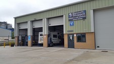The front of the Bassett & Sluggett unit with its sign above the office door